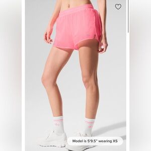 ALO Yoga Game Time Short In Neon Bubblegum